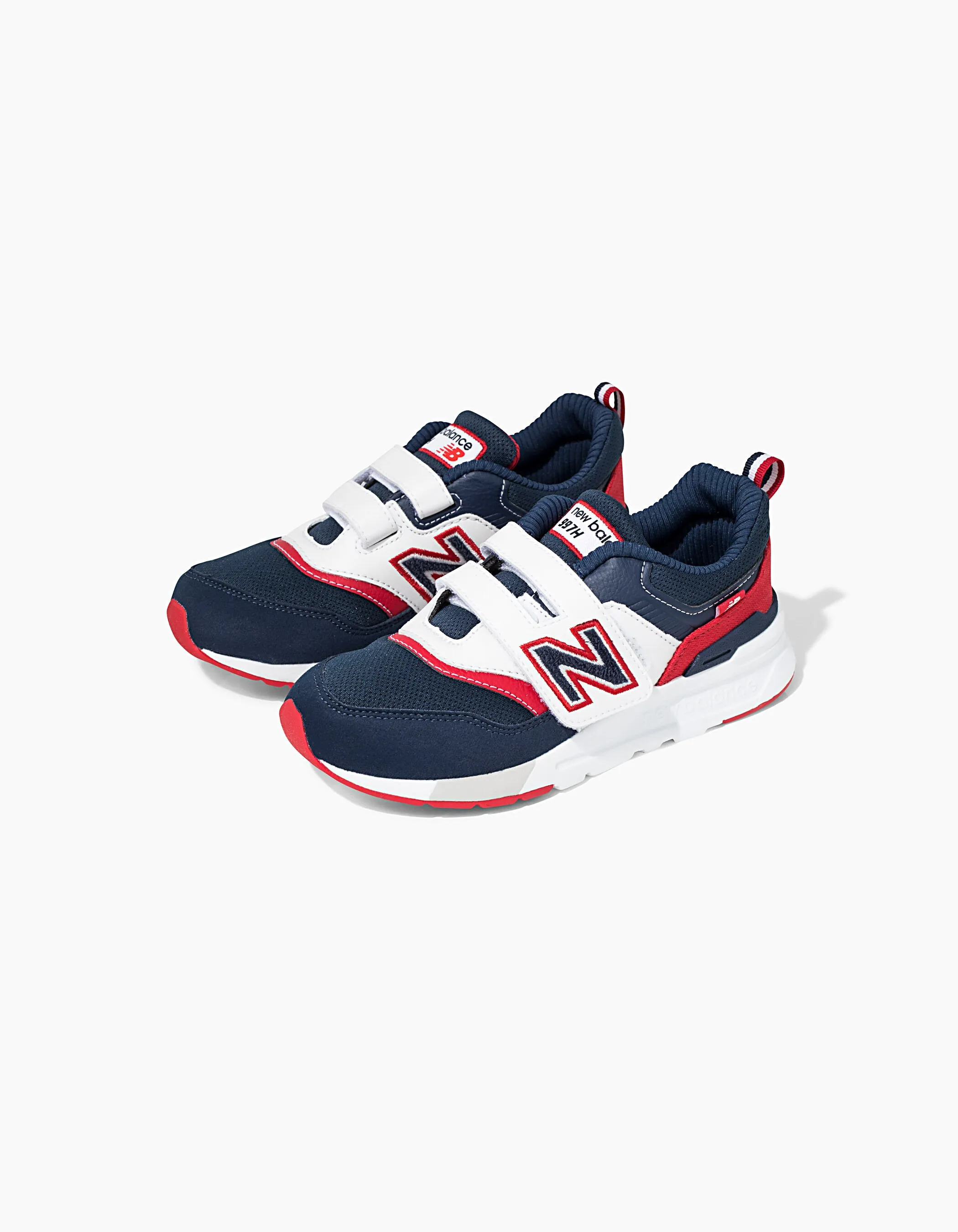 New Balance navy boys sneakers.